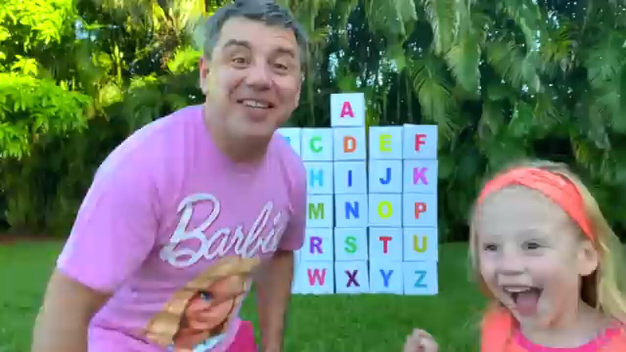 Nastya and dad open boxes with surprises to learn the alphabet.