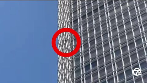 Climber scaling Renaissance Center ticketed