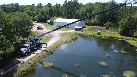 Pulling Heart Pine and Heart Cypress Logs with a Crane From Our Millpond