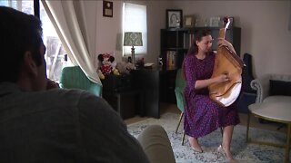 Ukranian musician playing traditional instrument at Grammy's