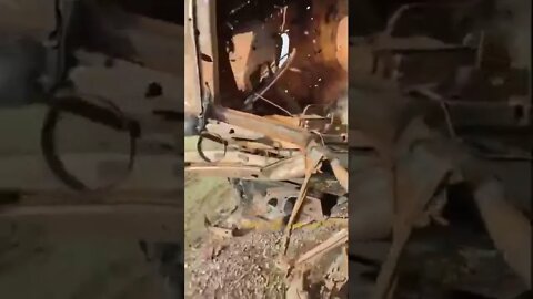 destroyed Ukrainian Husky armored car and truck with mines