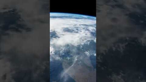 Earth from The Orbit With Clouds