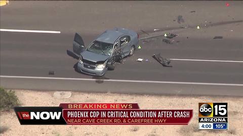 Phoenix officer in critical condition after crash