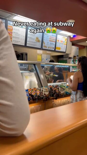 Video shows a man making a sandwich barefoot on a #Subway counter in #Chicago.