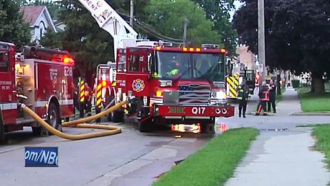 Crews battle fire in Oshkosh home