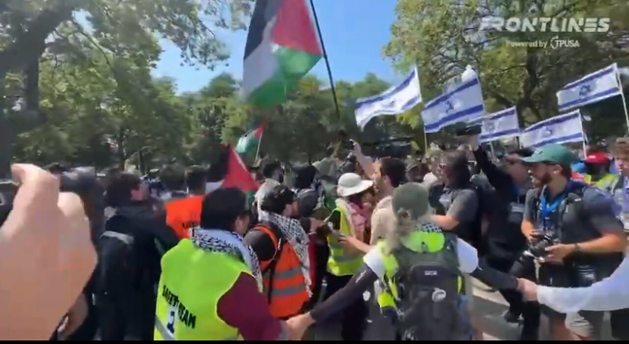 Pro Israel group arrives outside of the DNC surrounded by pro Palestine protesters