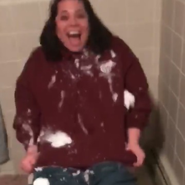 A Woman Gets Pelted With Snowballs While Trying To Use The Bathroom