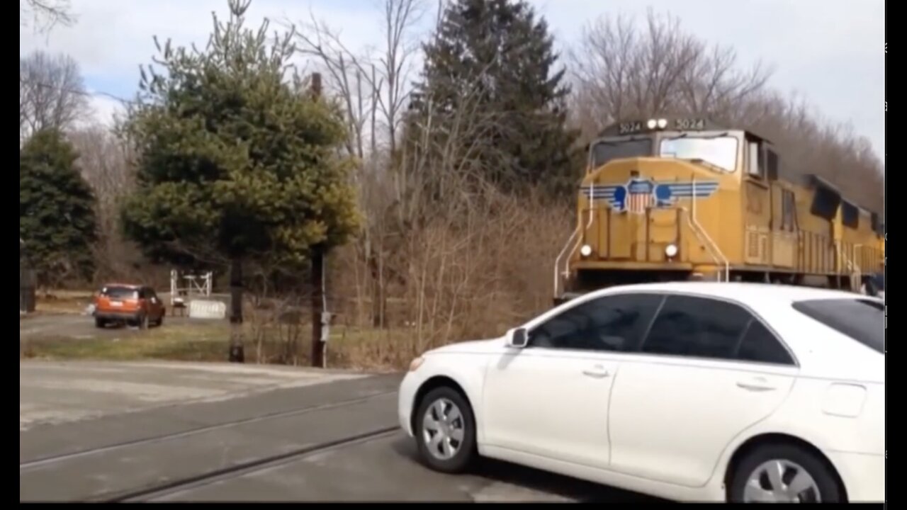 Car Wrecked Trying To Cross In Front Of Train