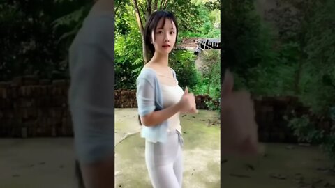 Young Chinese Girl Seems Unsure of Herself