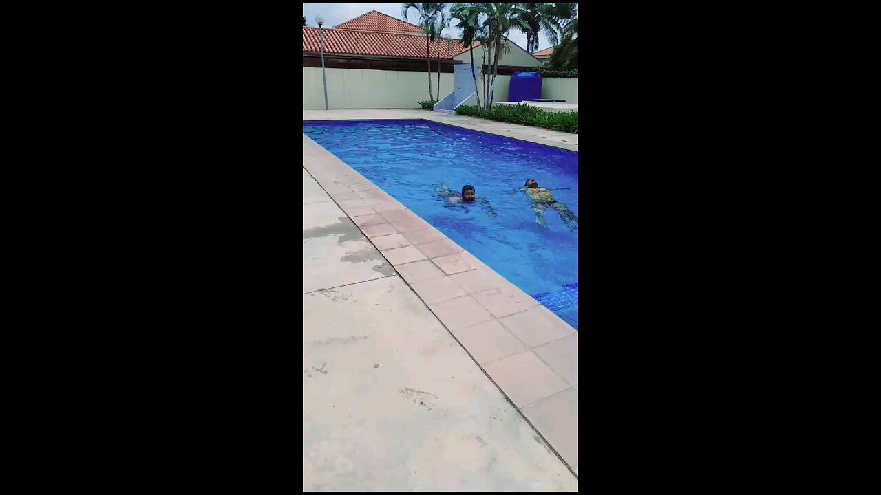 swimming in swimming pool