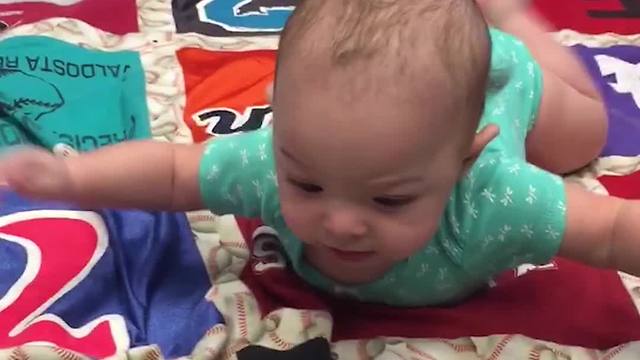 Little Baby Boy Is Doing Tummy Time Like Superman