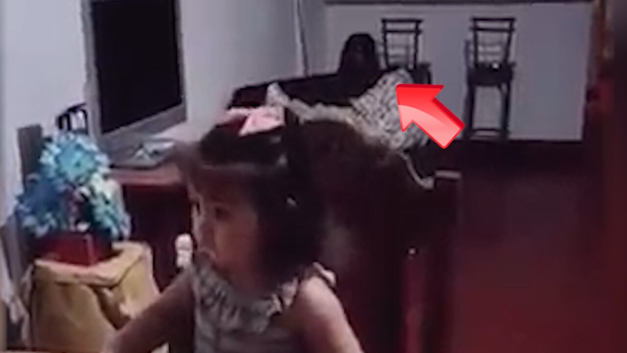 No one is supposed to be behind the child but they are being peeked at [ghost]