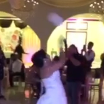 Woman Catches Bouquet At Wedding, Boyfriend's Reaction Is PRICELESS