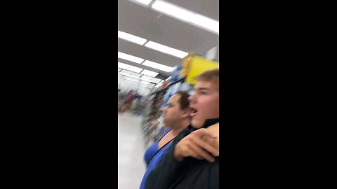 Transgender man puts influencer in a HEADLOCK while dragging him through a supermarket and shouting.