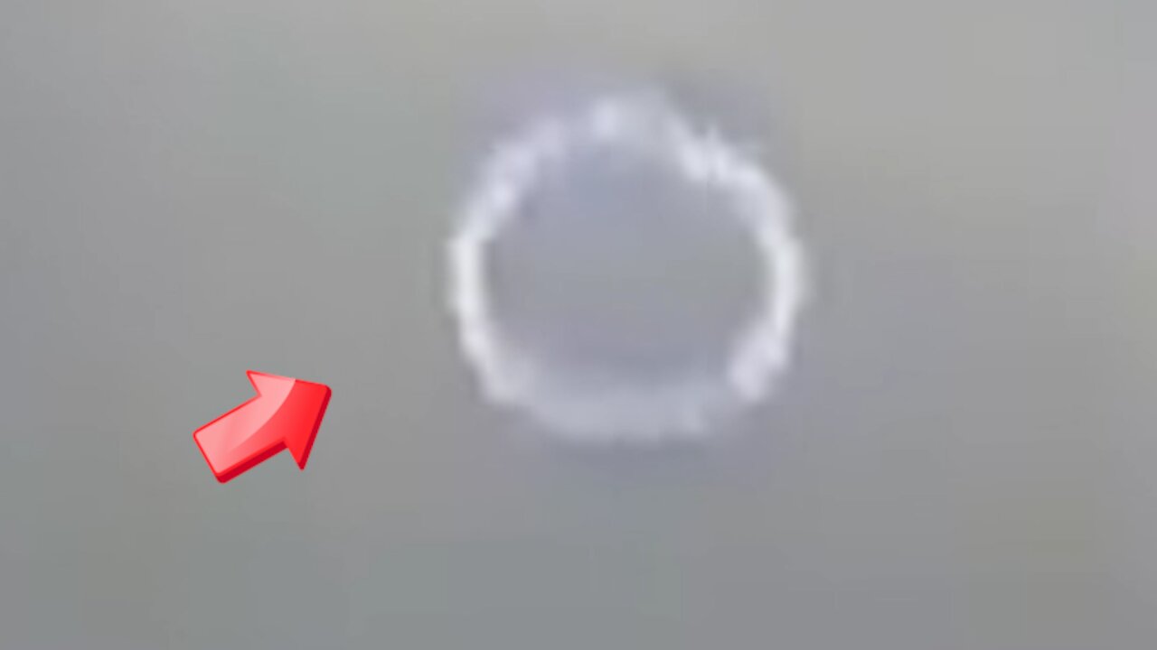 Sighting of a ring-shaped UFO over a field [Space]