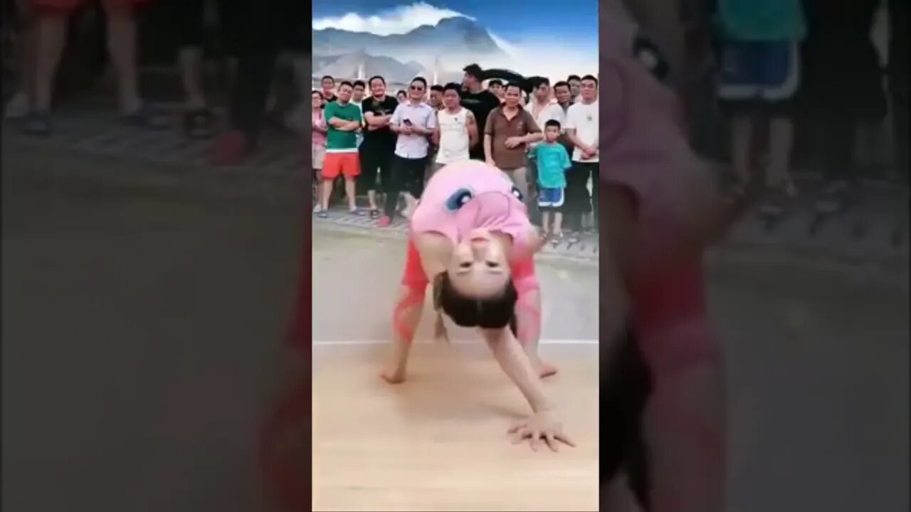 Out Favorite Chinese Contortionist Girl Is Twisting Up Again