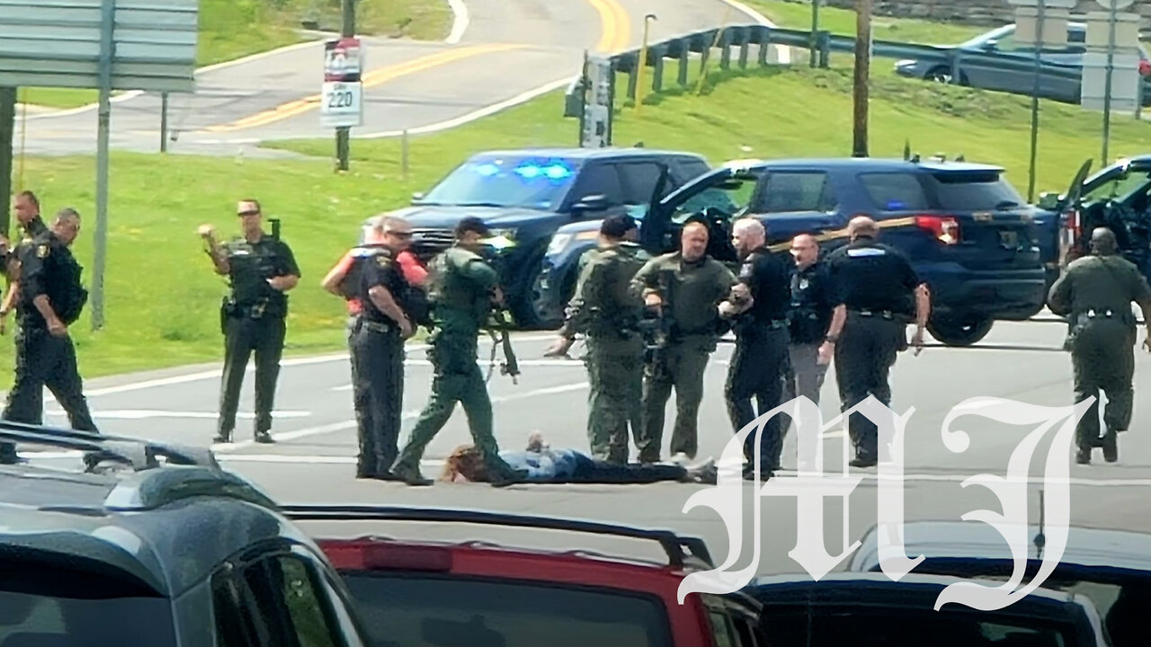 Police shoot man in Beckley waving pistol on freeway.