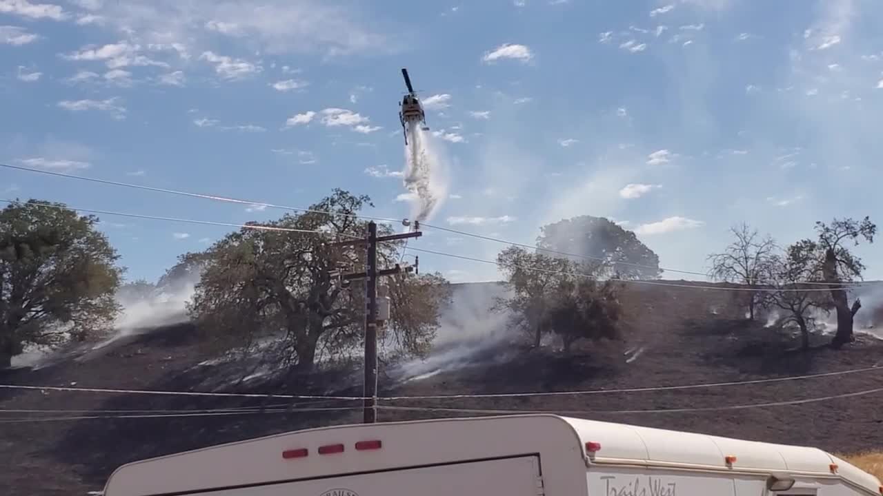 Helicopter drops water on Arosa Fire in Tehachapi