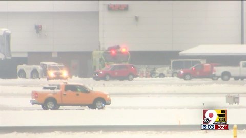 Delta plane slips off tarmac while taxiing