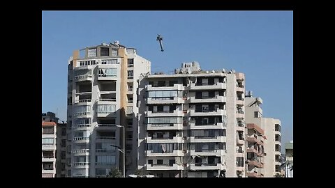 Photos capture moment missile launched from an Israeli jet hits a building in Beirut