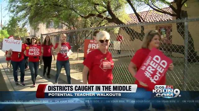 District leaders showing support for teachers while trying to stop a walk out