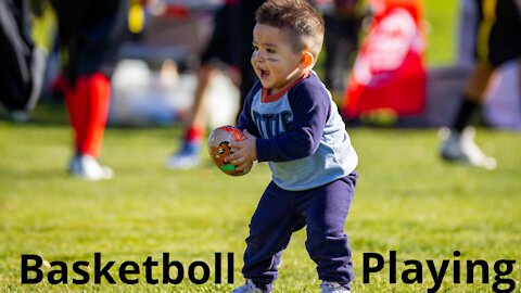 Baby playing with basketball