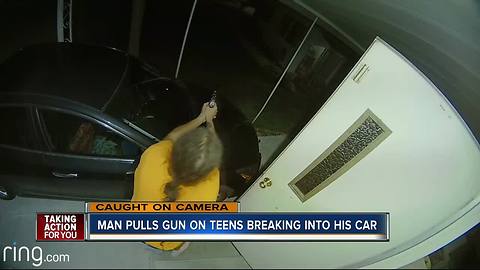 Homeowner armed with a gun confronts teens breaking into car