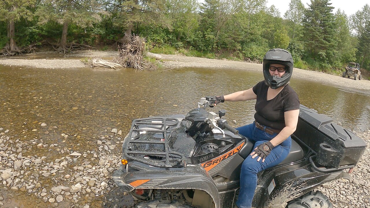 Washing the quads in a river