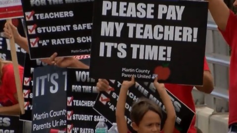 Dozens gather to rally for teachers in Martin County