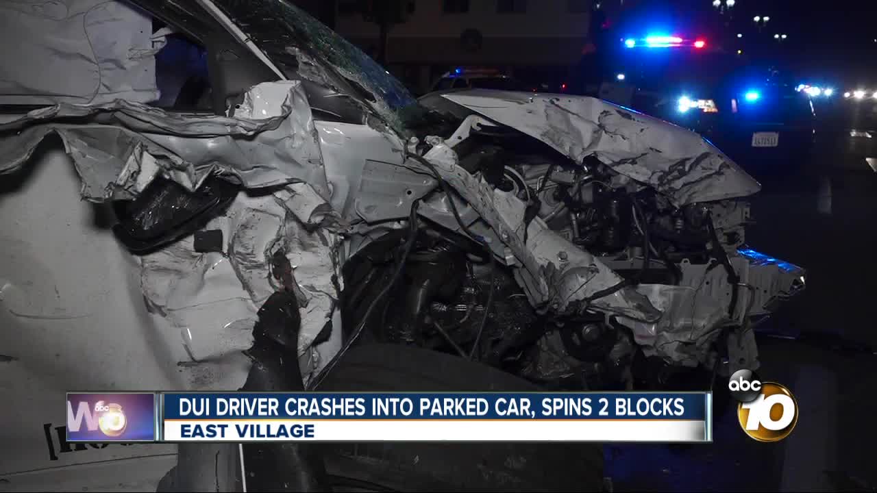 Driver hits parked car, spins