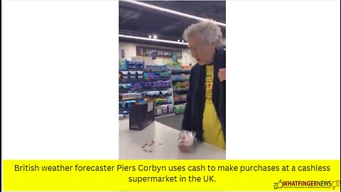 British weather forecaster Piers Corbyn uses cash to make purchases at a cashless supermarket