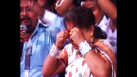 Woman Rubs Chilis In Eyes