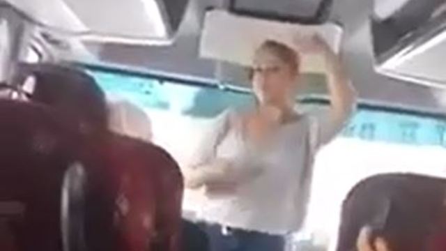 This Woman Dancing on the Bus