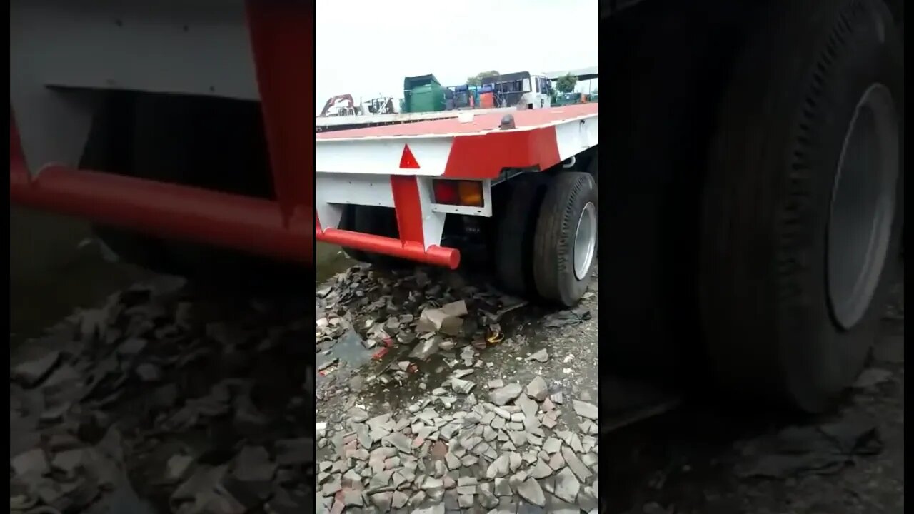 Tail of a Trailer Truck with an Old Scania P380 Head