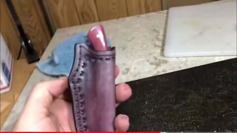 Designed a leather sheath for the neck knife