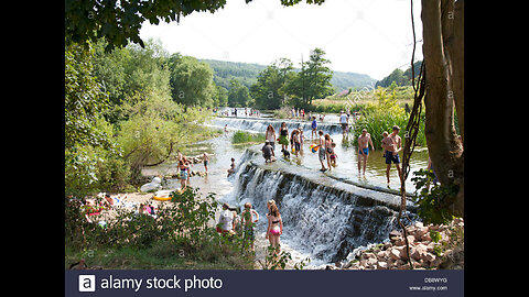 Amazingly popular wild swimming bathing spot on the River Avon near Bath, England