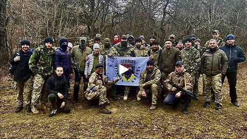 "People-In-Fatigues" helping "English-Speaking-Tourists" in Ukraine