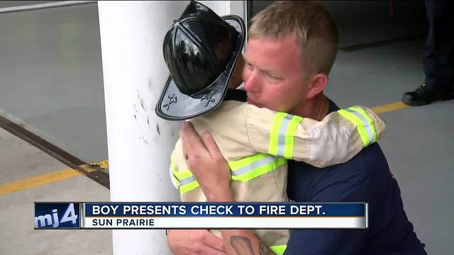 Boy who raised $6,000 at lemonade stand delivers money to Sun Prairie FD