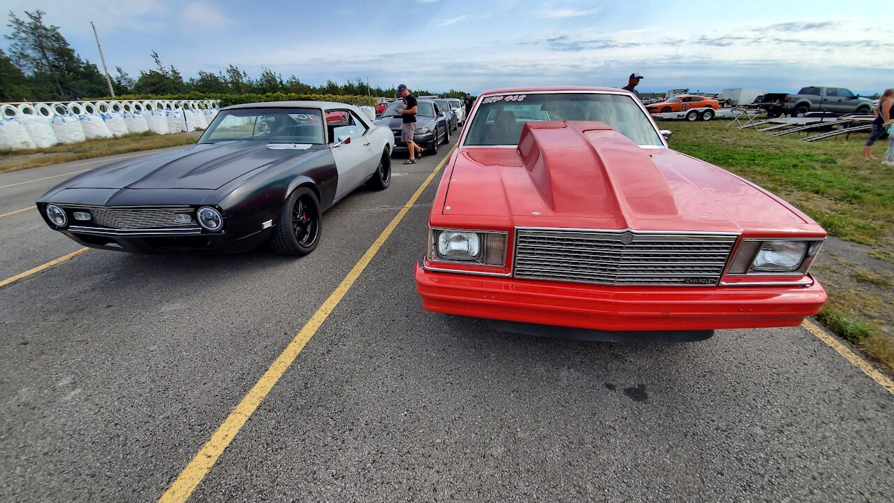 68 Chevy Camaro Vs. 79 Chevy Malibu 1/4 Mile Drag Race !