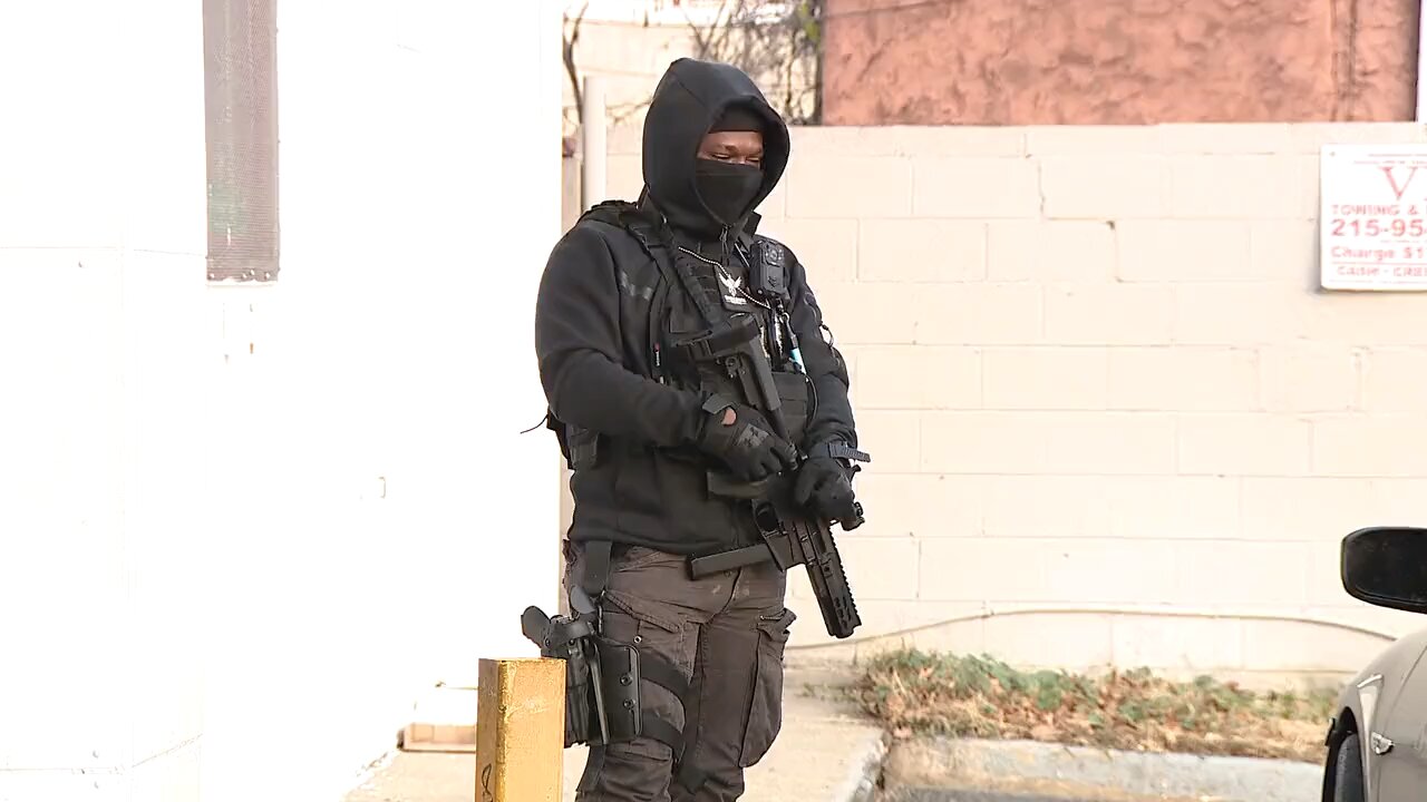 Store business owner hires people to protect his store