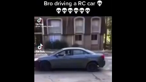 Black kid drivning rc car in o block