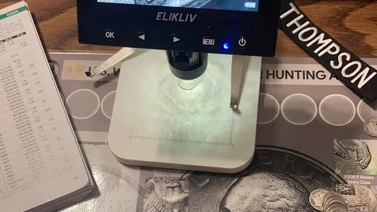 Looking thru Silver Dimes for varieties and errors.