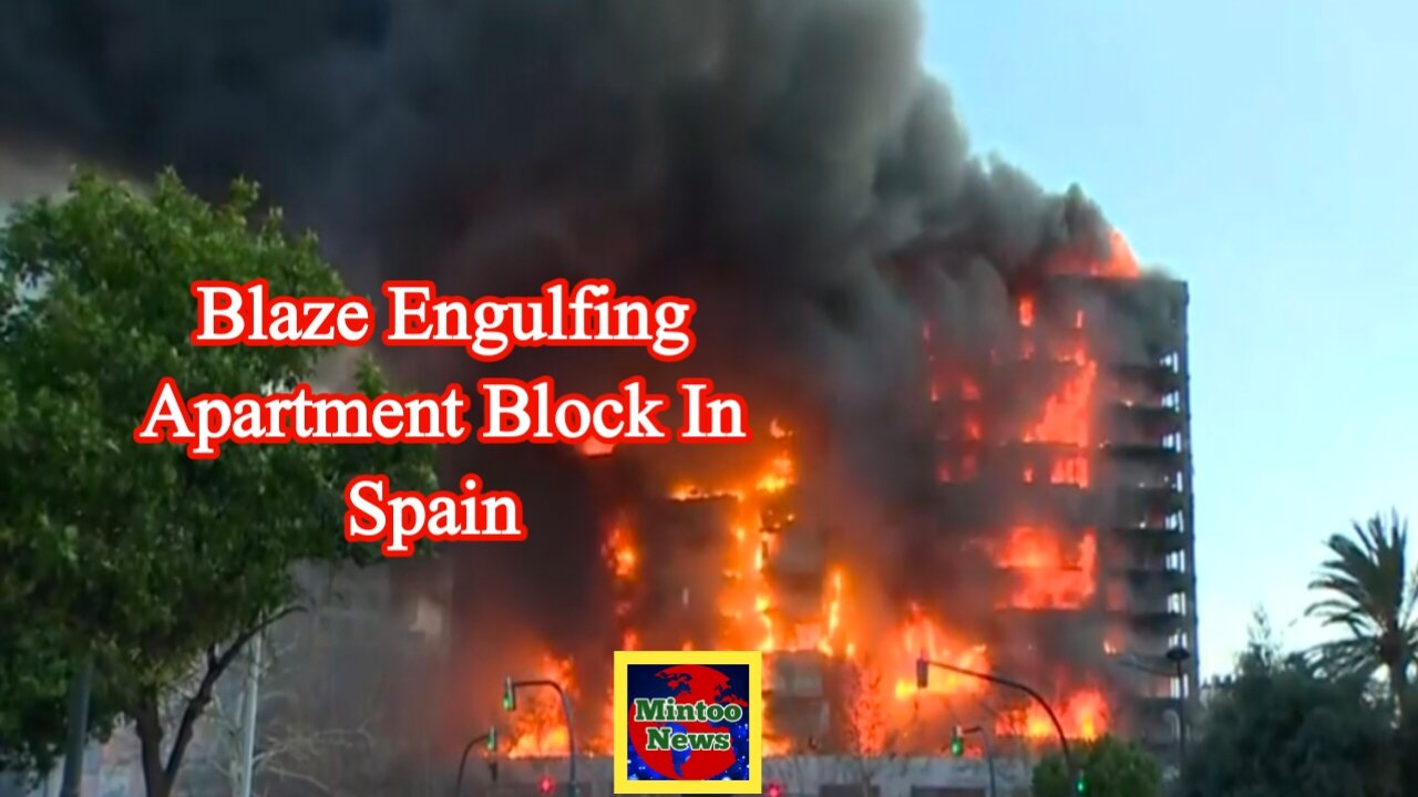 Firefighters battle huge blaze engulfing apartment block in Spain
