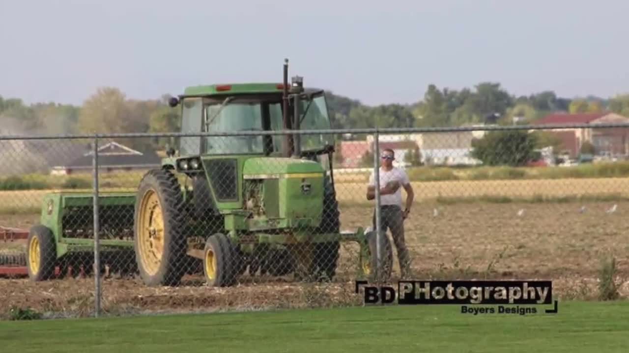 Iconic picture of a Caldwell farmer standing for the National Anthem takes on a life of its own