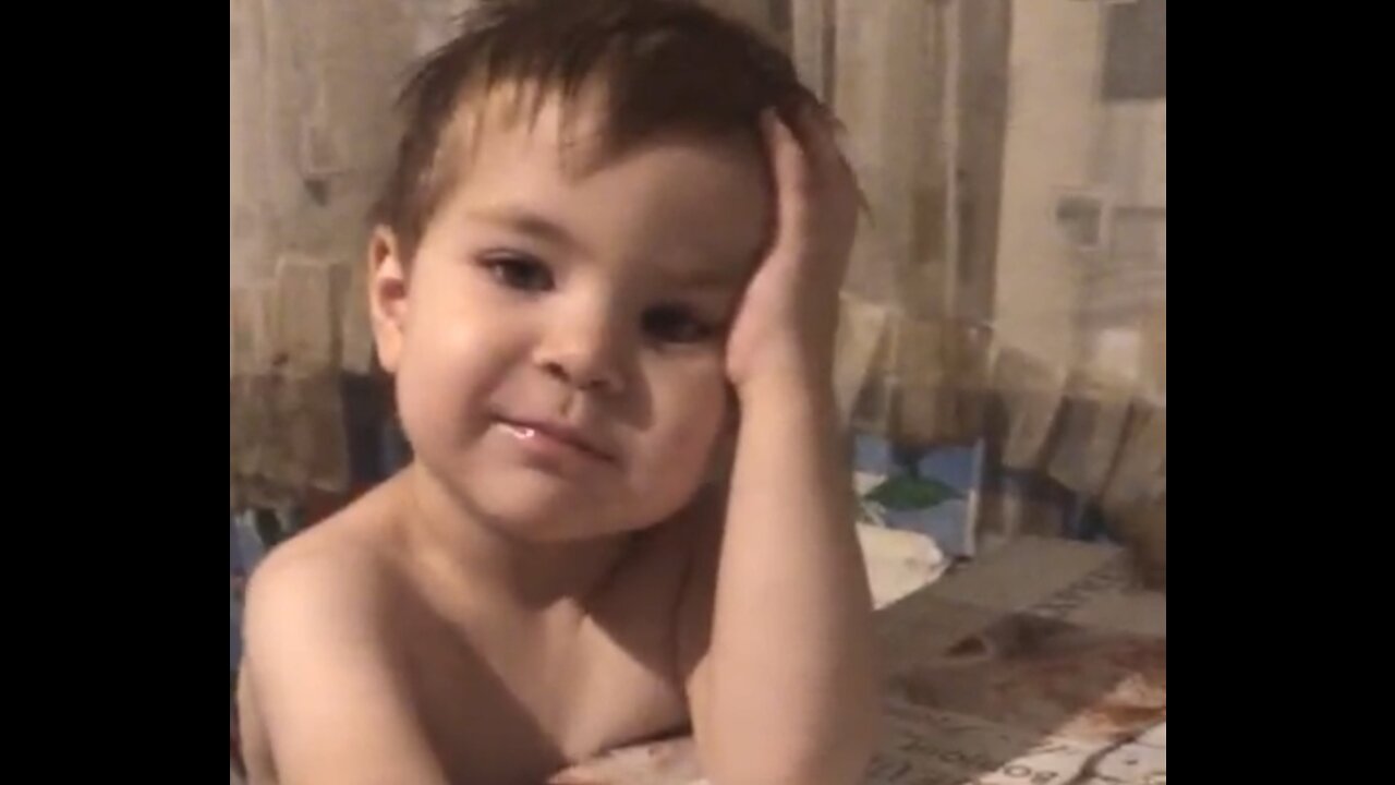 Funny Boy Dancing and Jumping to the mMusic