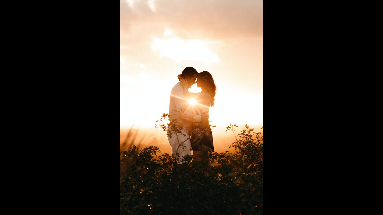 Loving couple in the blue beach