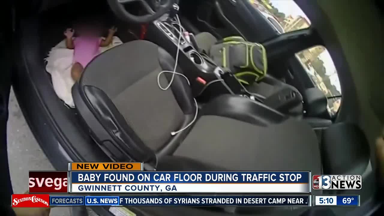 Man stopped for driving with baby on lap