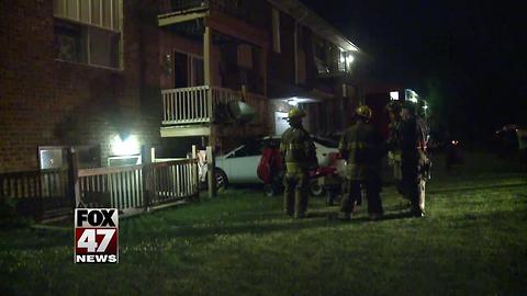 Car crashes into Lansing apartment