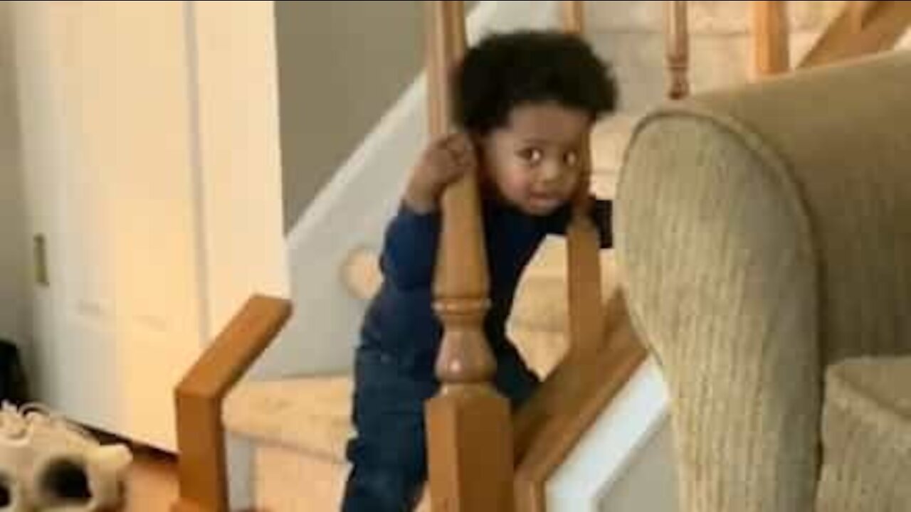 Baby gets head stuck between staircase railings