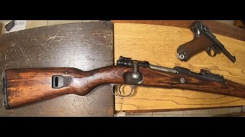 the Mauser K98k Standard German WWII rifle; built from surplus parts